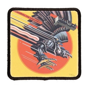 May include: Square patch with a black border featuring a retro-style illustration. The design includes a mechanical bird of prey with the text "SCREAMING FOR VENGEANCE" and a red sun in the background. The bird is black, gray, and yellow.