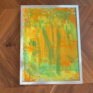 May include: A set of three ceramic mugs with a speckled, matte finish. The mugs are in shades of cream, light brown, and dark brown. Each mug has a simple, minimalist design and a rounded handle. Perfect for coffee or tea.