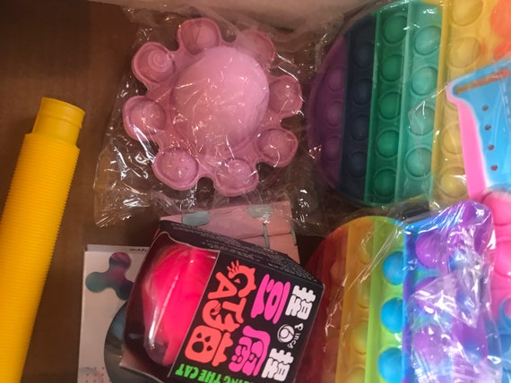 Mystery Fidget Box Includes 4 Pop Its 