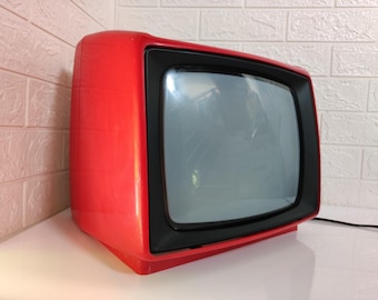 Televisor portátil vintage da Iugoslávia/ TV Iskra/ Televisor retrô/ TV vermelha icônica do estilo moderno de meados do século/ TV funcionando/ Iugoslávia dos anos 80