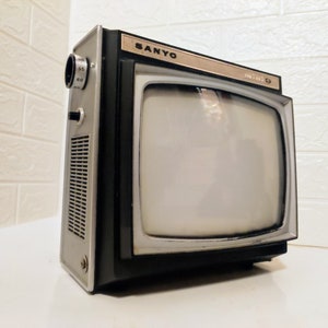 Mini TV portable vintage, télévision CRT à écran noir et blanc et récepteur  radio, Atlanta TV -  France