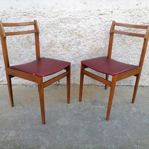 1 sur 2 chaises en bois vintage / chaises en bois et en similicuir rouge / chaises de salle à manger / meubles rétro / chaises yougoslaves / chaises Stol Kamnik / années 70