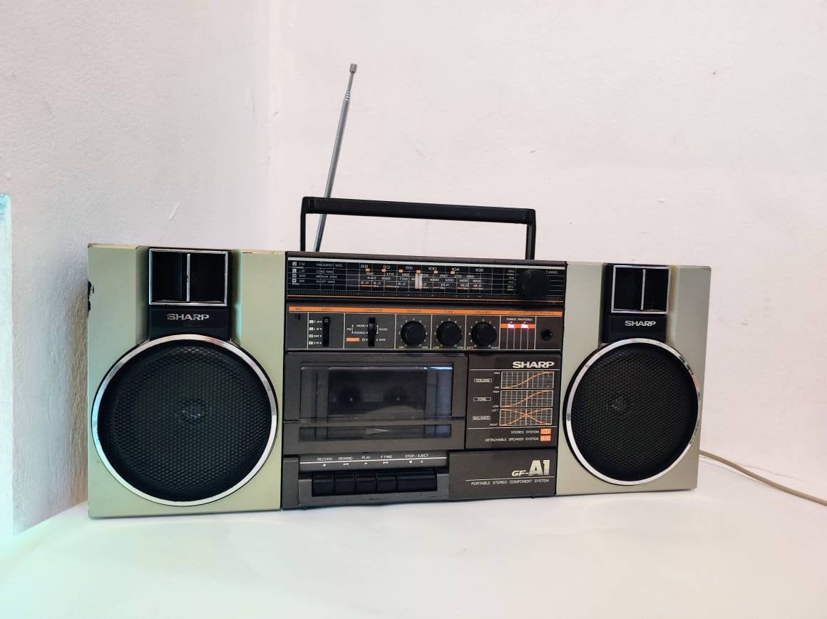 Portable radio cassette player made by the Sharp Corporation, radio cassette  