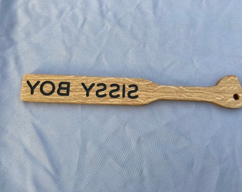 Paleta de madera para azotar