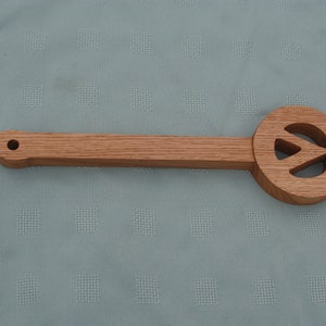 Paleta de madera para azotar