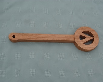 Paleta de madera para azotar