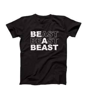 May include: Black t-shirt with the word "BEAST" repeated three times in white, with each repetition slightly offset from the one above it.