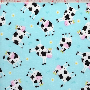 Koeblauwe quilt 100% katoenen kinderstof op maat gesneden