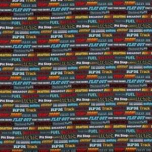 May include: A repeating pattern of racing-themed words in various colors, including red, blue, and white, on a dark gray background. Words like "RPM Track," "Fuel," and "Flat Out" are visible.