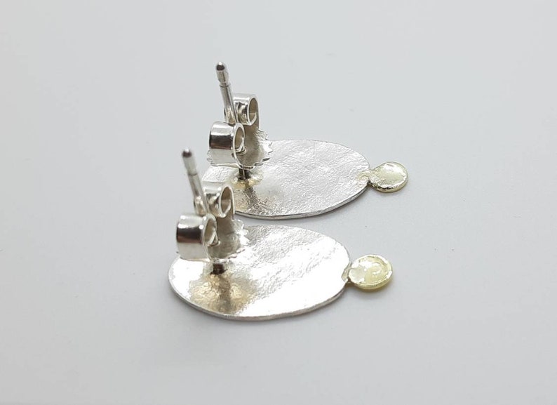 silver ear studs with 14k gold accent image 5