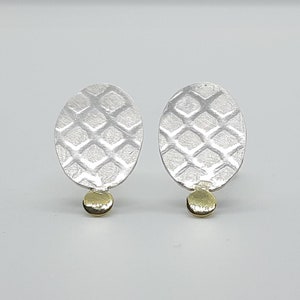 silver ear studs with 14k gold accent image 1