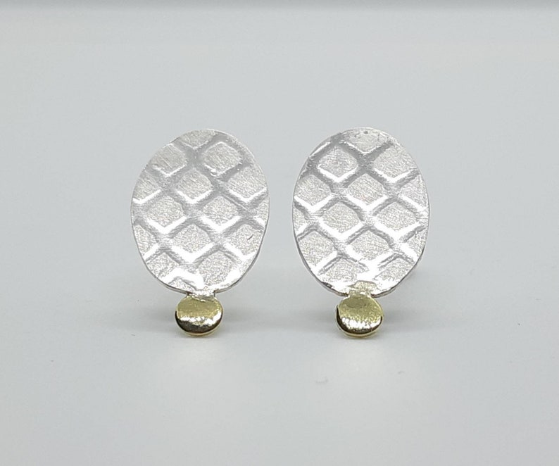 silver ear studs with 14k gold accent image 1