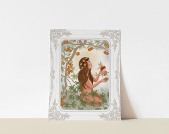May include: A watercolor print featuring a woman in a garden, surrounded by orange fruit and green leaves. The woman has long brown hair and is wearing a floral crown. The print is framed with a decorative border.