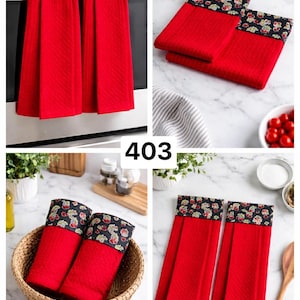 May include: Red kitchen towels with a floral patterned top border. The towels are displayed in various settings, including hanging on an oven and folded on a countertop. The number "403" is visible in the image.