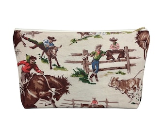 Flat Bottom Zippered Accessory Bag: Vintage Retro Western Cowboy Americana. Available in two sizes.