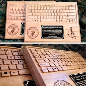 May include: A wooden plaque with a keyboard design, a Marine Corps emblem, and a message thanking Cpl Daquan "Complain A Lot" Rollins for his service. The plaque is a personalized gift for a Marine.