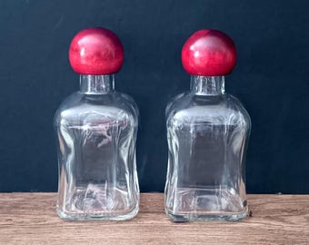 Retro small glass clear bottles with lids