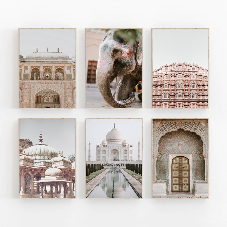 May include: A set of six framed prints featuring various architectural landmarks in India. The prints showcase intricate details of the Taj Mahal, Hawa Mahal, and other iconic structures.