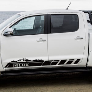 Tuning: Toyota Hilux von Wald mit sechs Sidepipes! - AUTO BILD