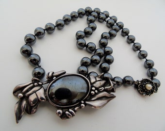 Rare vintage hematite silver broach pendant necklace, Floral design.