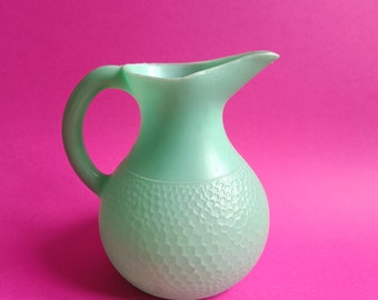 Carafe vintage en plastique