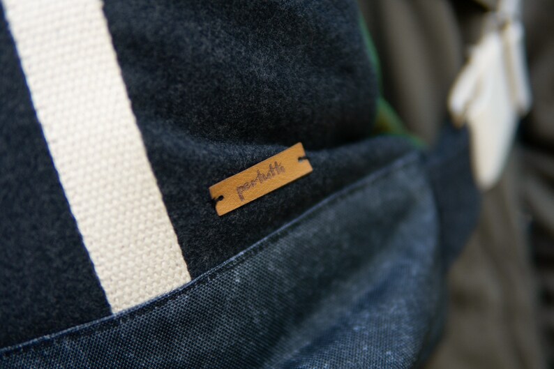 Wool backpack compressed in marengo grey