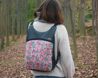 Black leather backpack with flowers