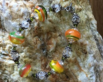 Orange Blossom Special - 8" Bracelet in Lampwork, Swarovski Crystal, & Balinese Silver Beads