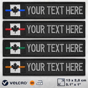 May include: Four black embroidered patches featuring a Canadian flag and the text "YOUR TEXT HERE" in grey. The patches have a blue, red, green, and orange stripe across the flag. The patches are 5.1 inches by 1 inch.