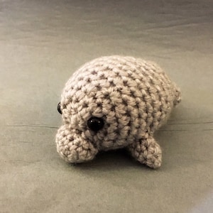A Crocheted Mini Manatee Stuffed Toy/ Amigurumi/Kawaii Styled Stuffed Toy/Manatee Plush/Plushie
