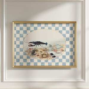 May include: A framed print of a watercolour painting depicting a blue lobster and other sea creatures on a sandy seabed. The background is a blue and white chequered pattern.