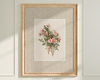 May include: A framed print of a vintage botanical illustration featuring a bouquet of pink roses with green leaves on a light pink background. The frame has a light wood finish and a delicate floral pattern.