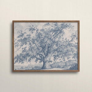 May include: A framed print depicting a detailed blue and white illustration of a large tree with extensive branches and leaves. The artwork is set against a light backdrop and enclosed in a brown wooden frame. The print has a classic, vintage aesthetic.
