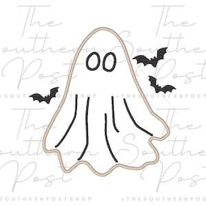 May include: An embroidery design featuring a white ghost with a tan outline and black oval eyes, accompanied by three small black bats flying around it. The text The Southern Post Shop is repeated in the background in a light gray script font.