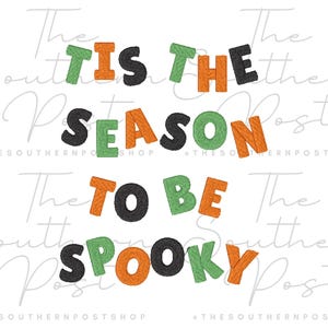 May include: An embroidered design featuring the text TIS THE SEASON TO BE SPOOKY in a repeating pattern of orange, green, and black letters. The letters have a visible stitched texture and are arranged in four lines against a white background.