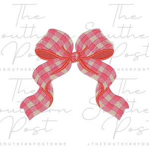 May include: A pink and tan gingham bow with a solid pink center and edges. The bow has long, flowing tails and is set against a white background. The text "The Southern Post" is in the background.