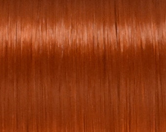 May include: A close-up of a smooth, straight, bright red-orange hair texture.