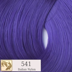 May include: Close-up of a purple nylon thread spool with the number 541 and the text "Italian Nylon" printed on a label.