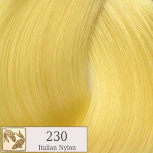 May include: A close-up of a bright yellow hair color swatch. The swatch is labeled "230 Italian Nylon".