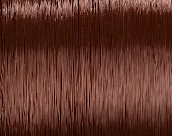 May include: Close-up of a smooth, shiny, auburn-colored hair extension. The hair is straight and appears to be very soft.