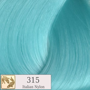 May include: A close-up of a light blue hair color swatch. The swatch is labeled "315 Italian Nylon".
