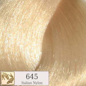 May include: A close-up of a light blonde hair color sample with the number 645 and the text "Italian Nylon".