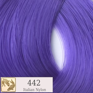 May include: A close-up of a purple nylon thread. The thread is wound into a coil and the label reads "442 Italian Nylon".