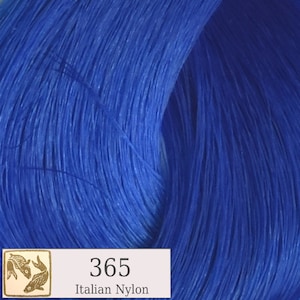 May include: A close-up of a bright blue yarn skein. The yarn is labeled "365 Italian Nylon".