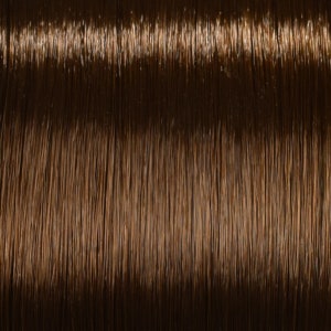 May include: Close-up of a rich brown hair colour. The hair is smooth and shiny, with a slight sheen.