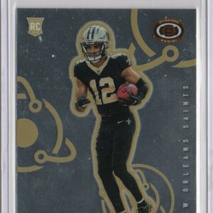 CHRIS OLAVE 2022 Panini Chronicles Dynagon #7 voetbalkaart - New Orleans Saints
