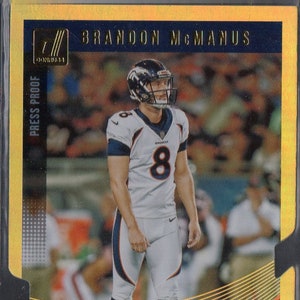 BRANDON McMANUS 2018 Donruss #93 Goud Persbewijs Parallelle Voetbalkaart #/25 - Denver Broncos