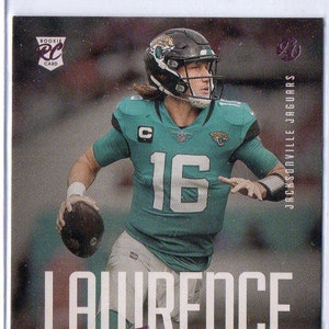Tarjeta de fútbol rosa paralela Panini Chronicles Luminance #201 de TREVOR LAWRENCE RC 2021 - Jacksonville Jaguars