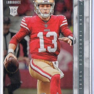 Tarjeta de fútbol BROCK PURDY RC 2022 Panini Chronicles Luminance #213 - San Francisco 49ers