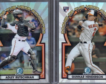ADLEY RUTSCHMAN & GUNNAR HENDERSoN 2023 Bowman Chrome Rookie of the Year Favorites Baseball Cards Lot (2) - Baltimore Orioles
